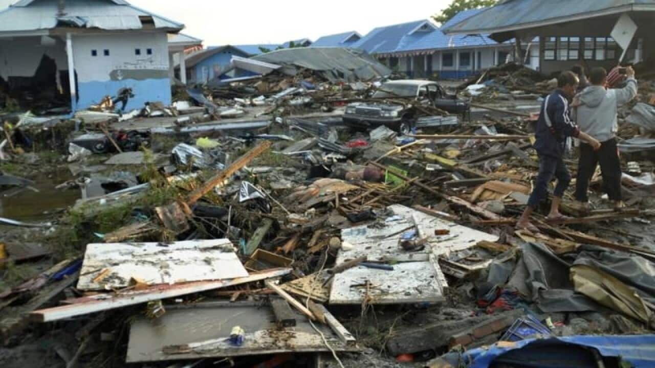 A tsunami up to six metres high has swept through the Sulawesi city of Palu, killing hundreds.