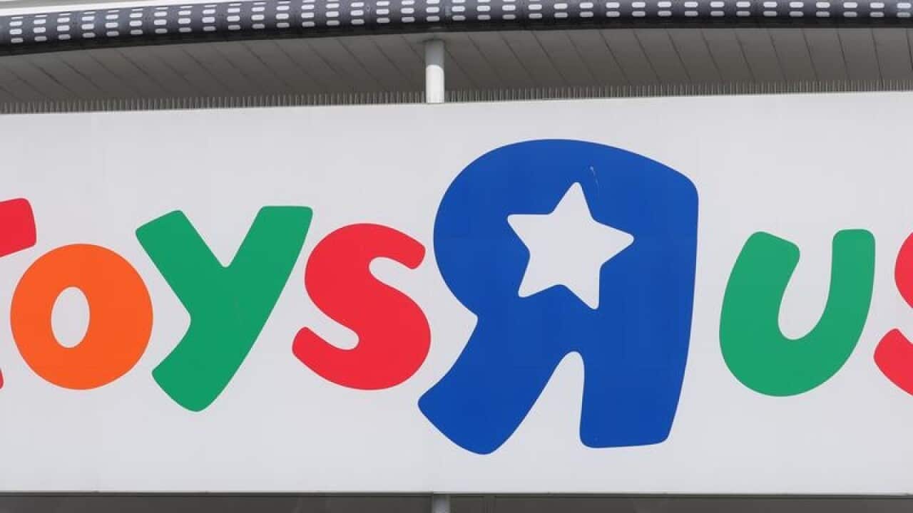 A Toys R Us sign on a store