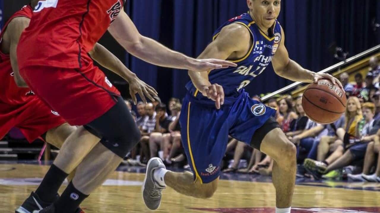 Travis Trice of the Bullets drives to the basket