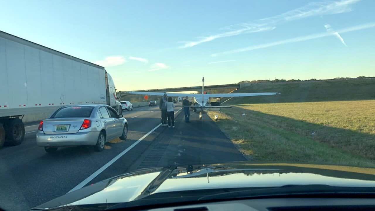a plane lost its engine and emergency landed on I-20 W in front of us.