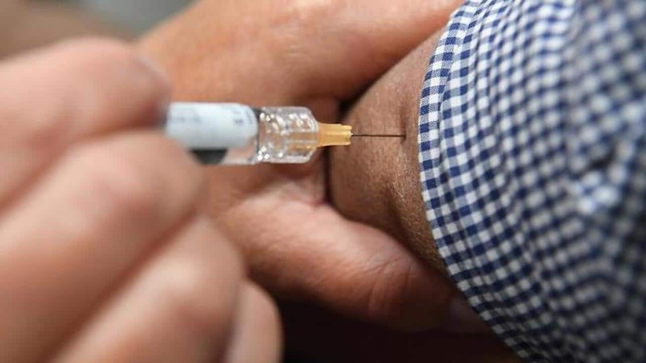 Health Minister Greg Hunt wants aged care workers vaccinated against the flu