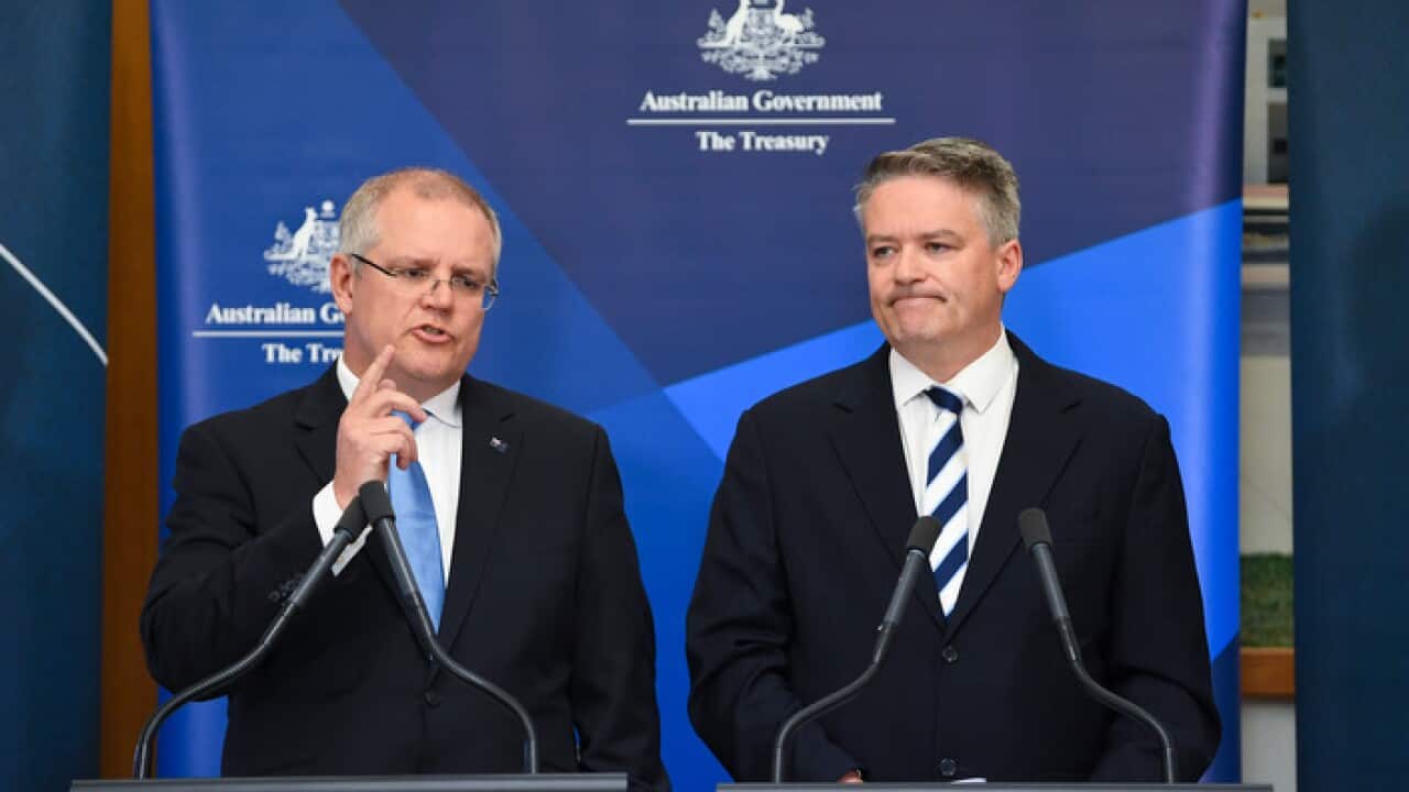 Australian Federal Treasurer Scott Morrison (left) and Australian Finance Minister Mathias Cormann.