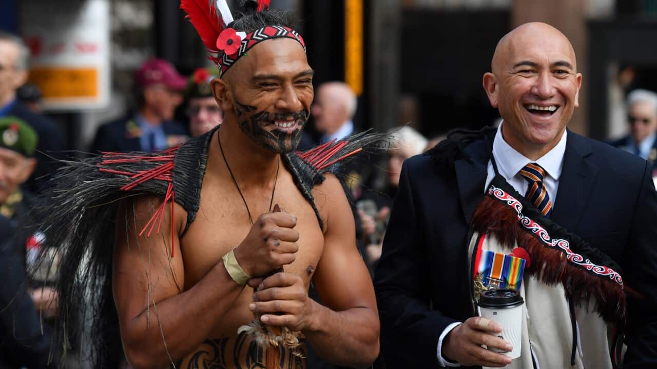 Two New Zealanders wait to march before the Anzac Day March on Elizabeth St in Sydney, Sunday, April 25, 2021. (AAP Image/Mick Tsikas) NO ARCHIVING