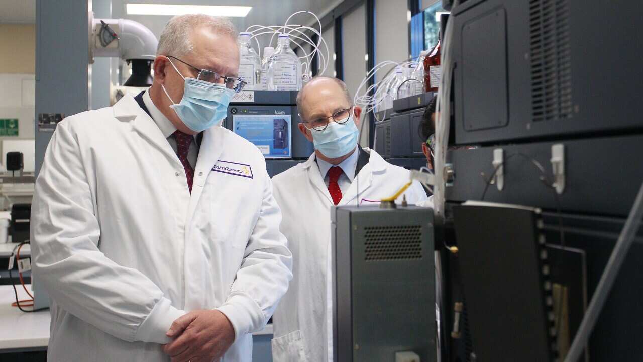 Prime Minister Scott Morrison and Professor Peter Kelly tour the Astra Zeneca laboratories in Macquarie Park, Sydney.