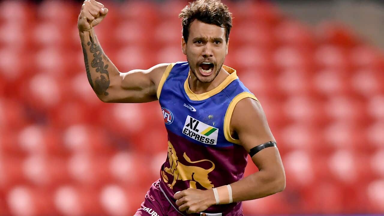 Callum Ah Chee of the Lions reacts after kicking a goal during the AFL Round 17 match between Brisbane Lions and St Kilda Saints at Metricon Stadium on the Gold Coast, Saturday, July 10, 2021. (AAP Image/Dave Hunt) NO ARCHIVING, EDITORIAL USE ONLY