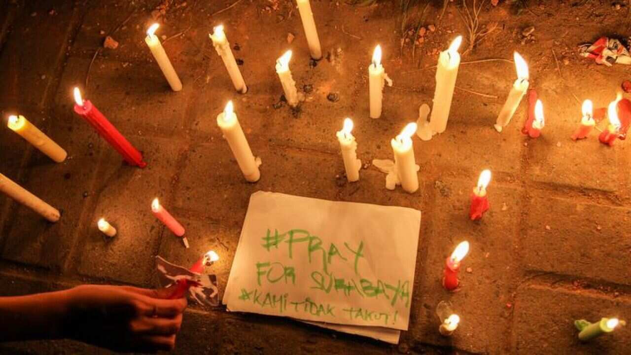 A candlelight vigil in Medan to support victims and families of the attacks in Surabaya