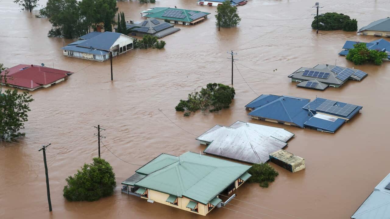 A supplied image shows flood-affected properties in Lismore.