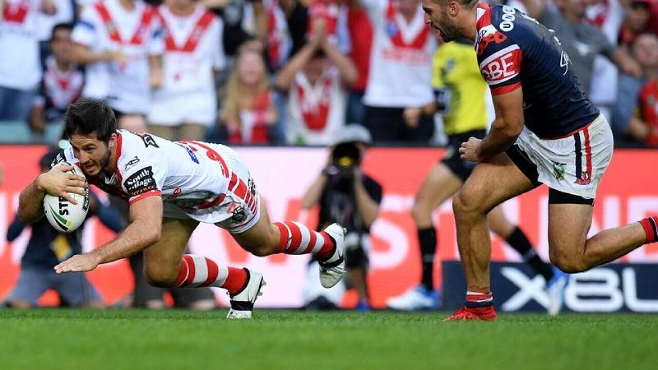 Ben Hunt of the Dragons scores a try during Round 8.