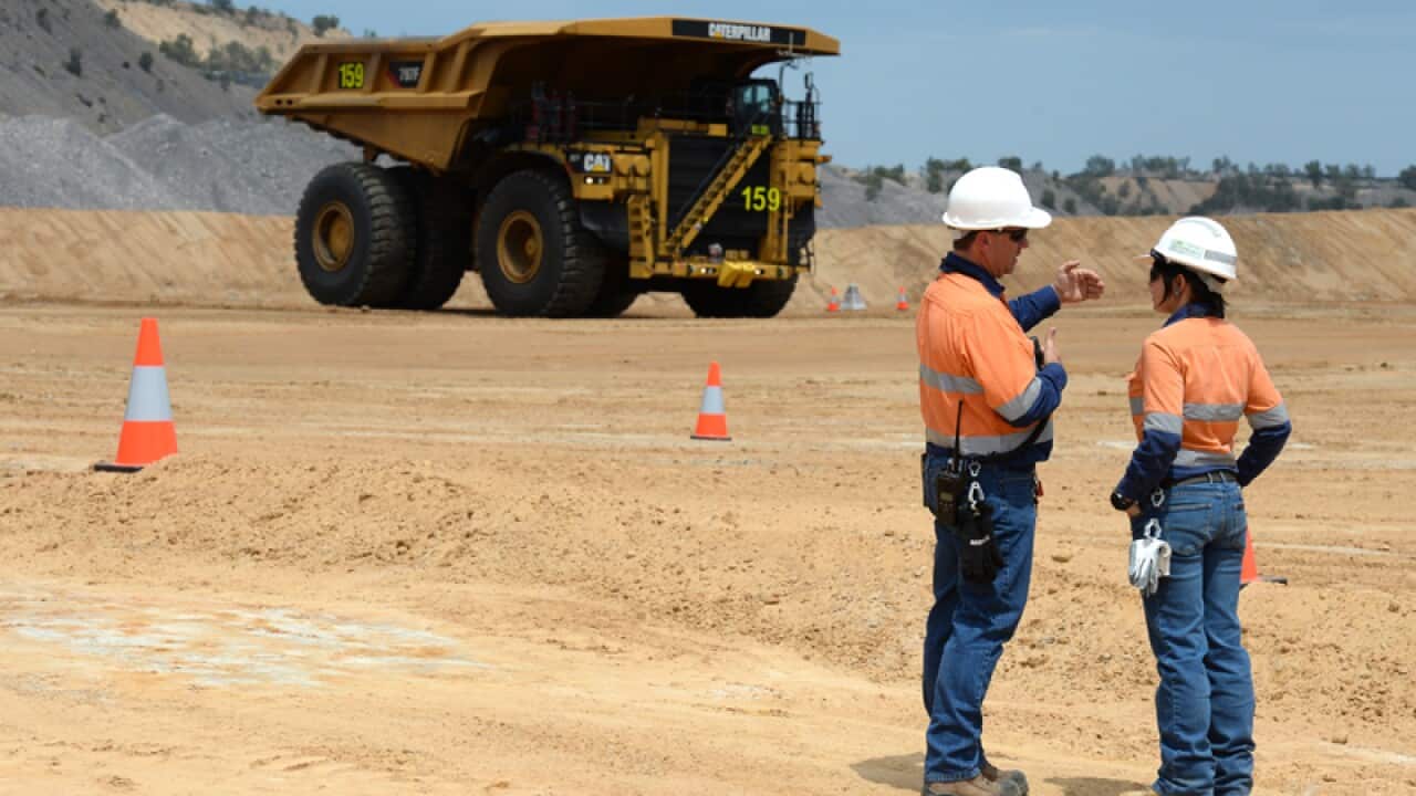 Workers at a BHP Billiton Alliance mine in Queensland