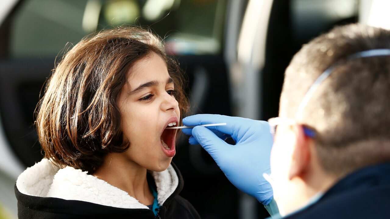 A person receives a COVID19 test in Broadmeadows, Melbourne.