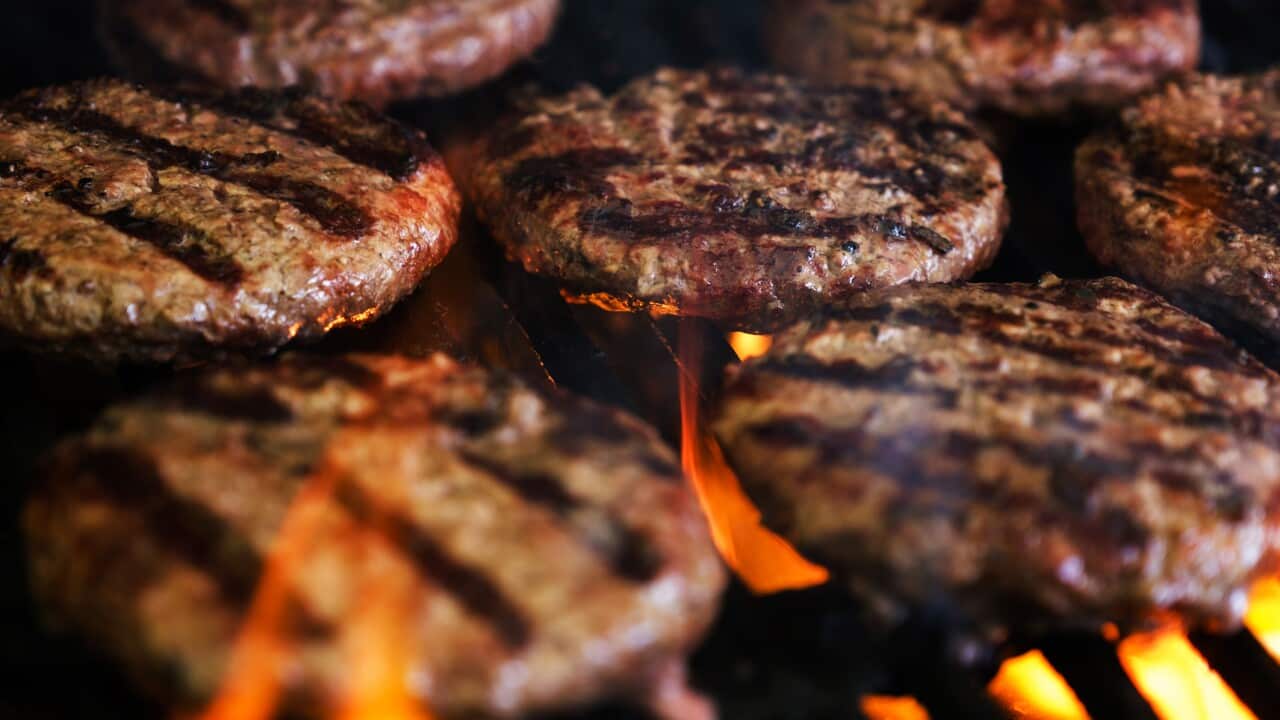 Hamburgers on barbeque grill
