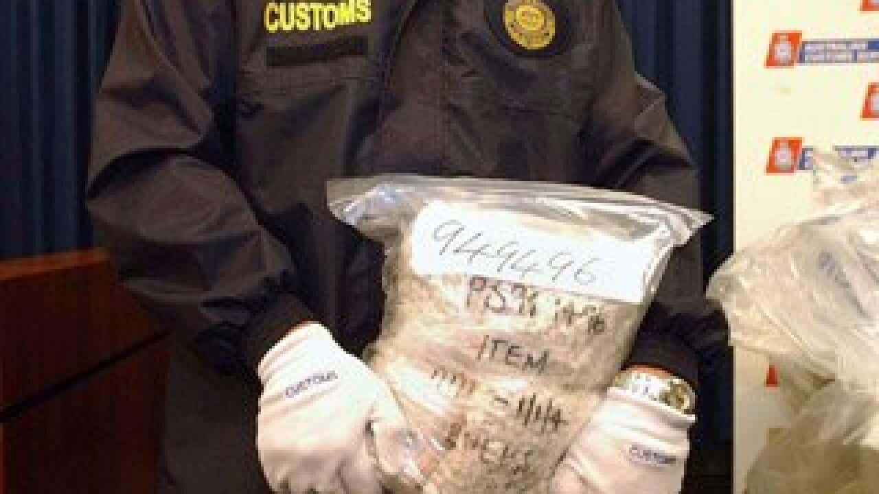 Police with an ecstasy seizure