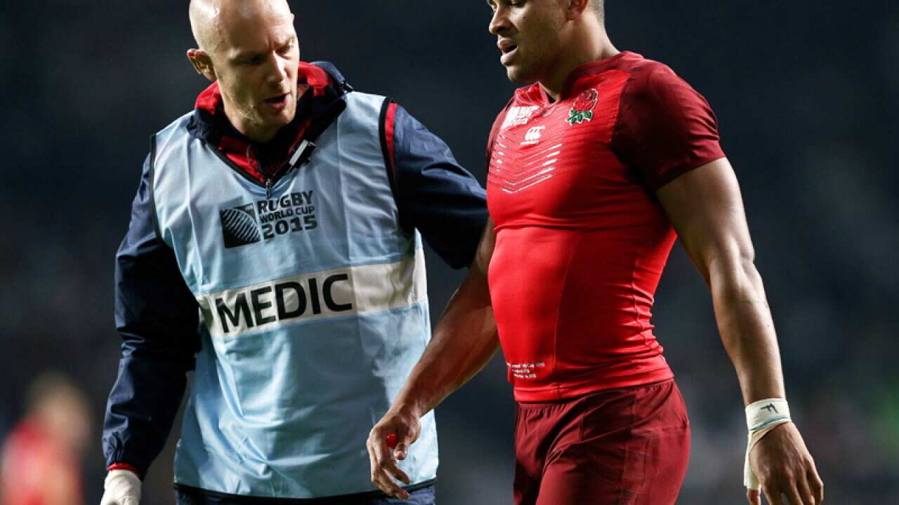England's Jonathan Joseph receives treatment