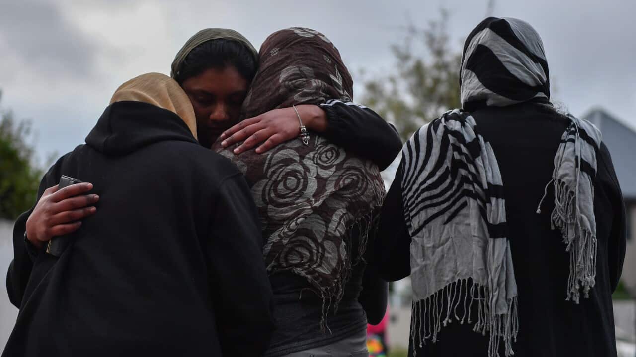 Muslim worshipers grieve at a makeshift memorial at the Al Noor Mosque in Christchurch, New Zealand.