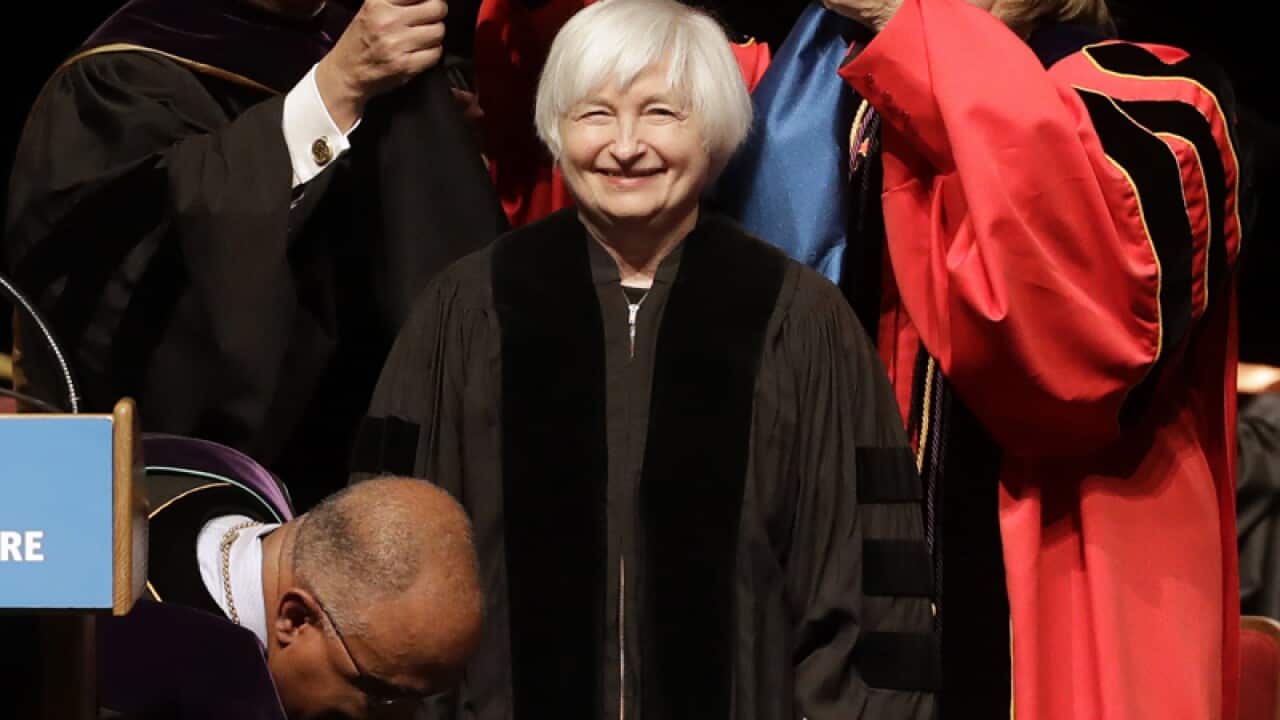 Fed Reserve Board Chair Janet Yellen is hooded for an honorary doctor