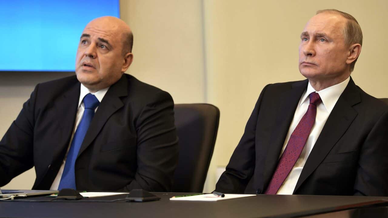 New Prime Minister Mikhail Mishustin (L) alongside Russian President Vladimir Putin (R).