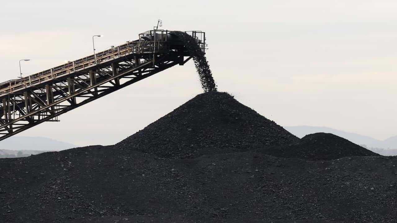 A stock image of coal being stockpiled