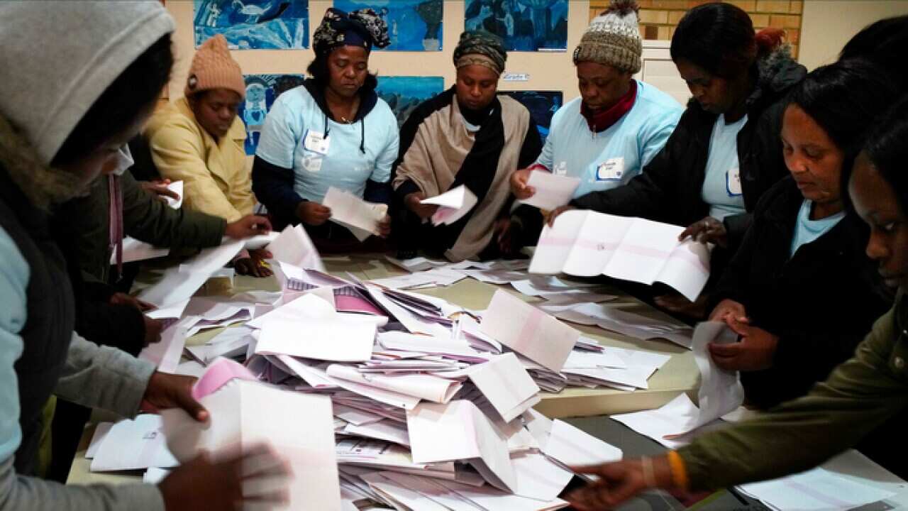 Electoral commission agents start counting the votes