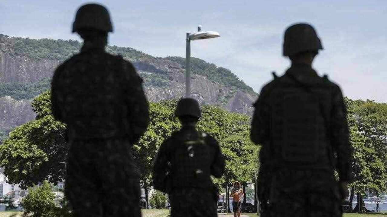 Members of the Armed Forces patrol the streets of Rio de Janeiro