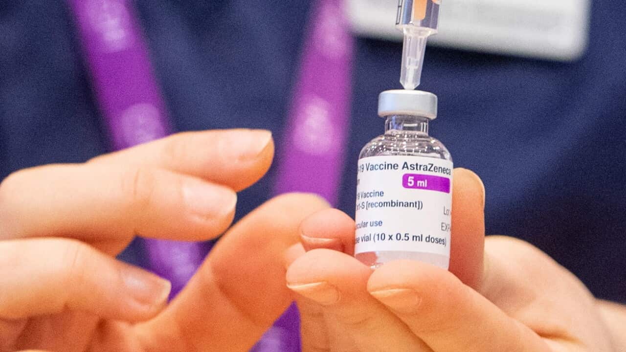 A nurse prepares a dose of the Oxford/AstraZeneca Covid-19 vaccine.