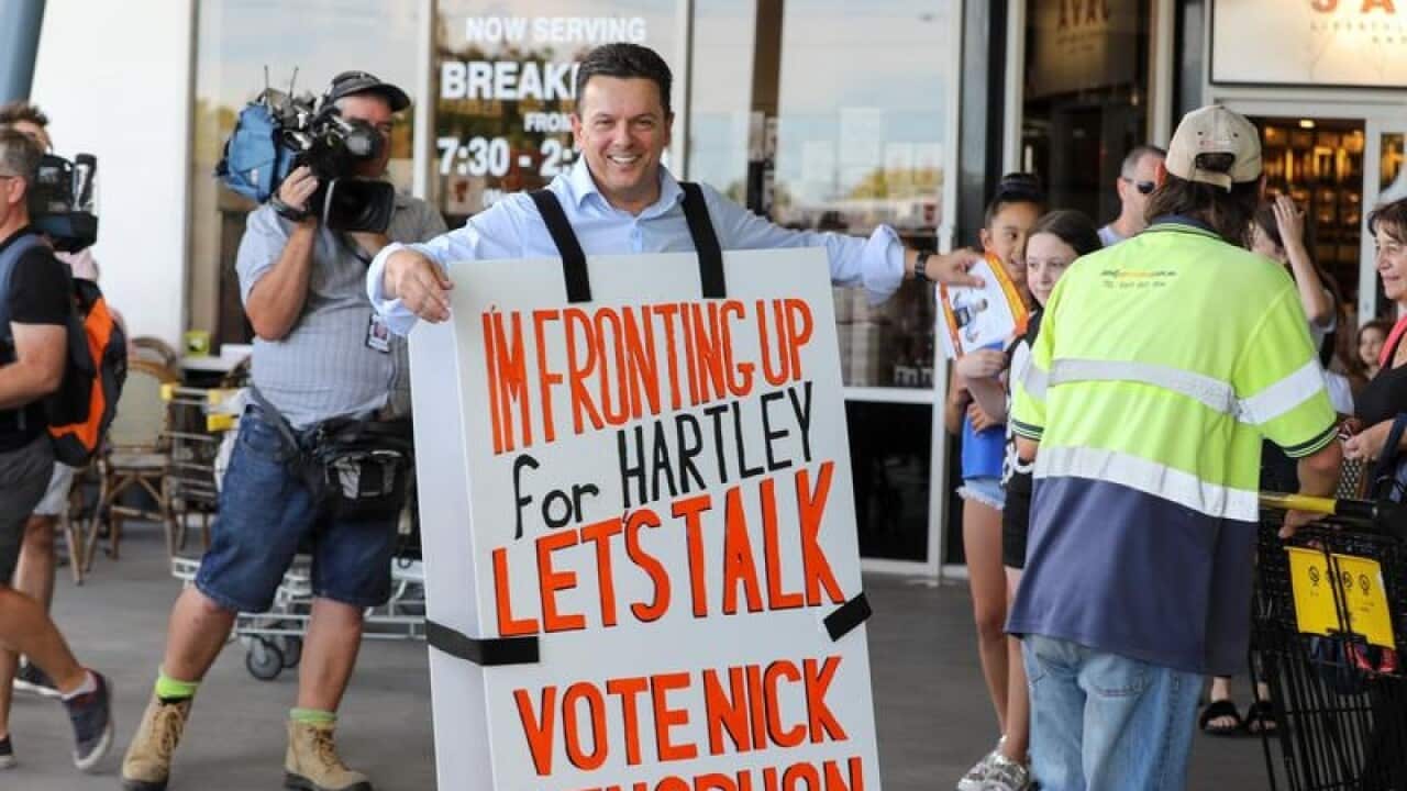 SA-Best leader Nick Xenophon wears a sandwich board to launch his election campaign in Adelaide.