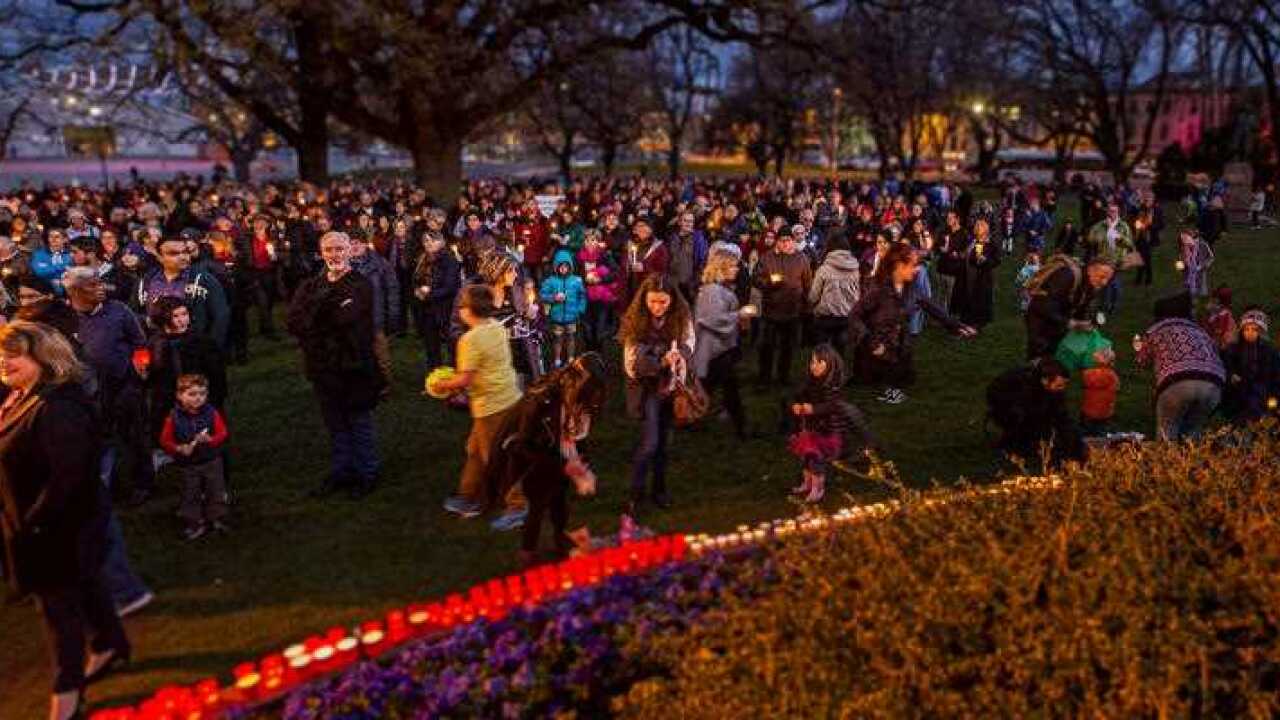 700 people gather at the Parliament Lawns in Hobart, Tasmania, Australia on September 7, 2015 to hold a vigil for Aylan al-Kurdi, the three-year-old Syrian boy who was found dead on a beach in Turkey.