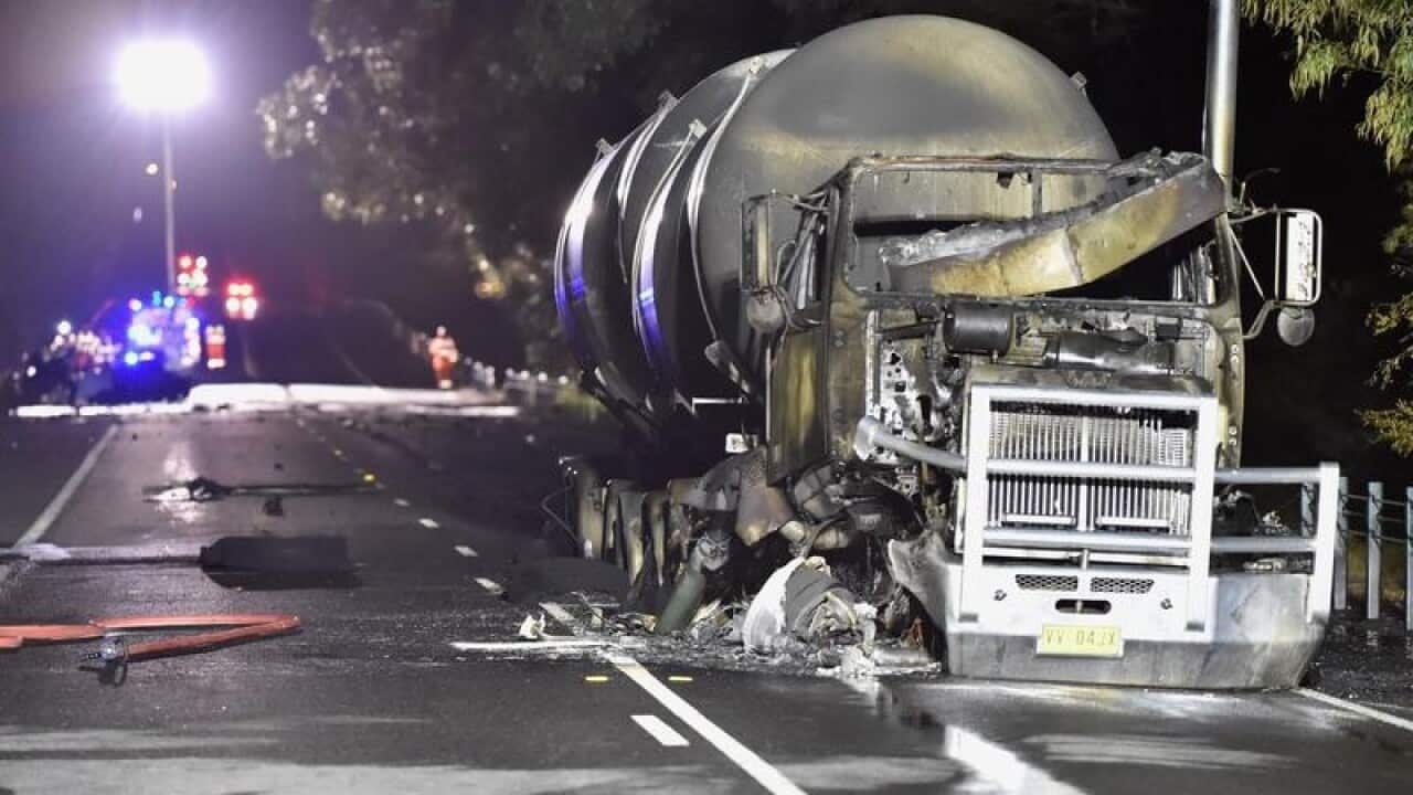 Emergency service crews at the scene of a truck crash.