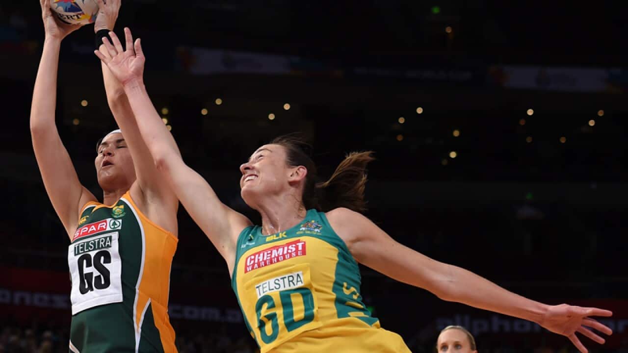 Australian Diamonds defender Rebecca Bulley (R)