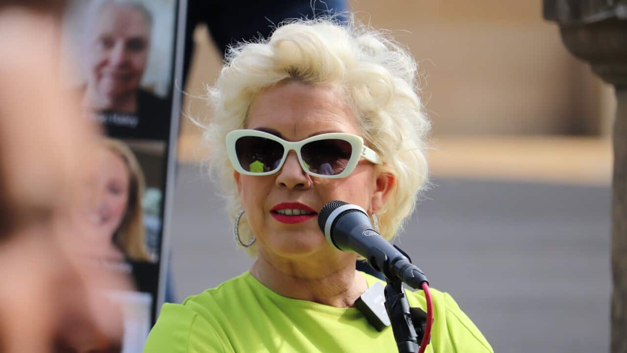 A woman in sunglasses.