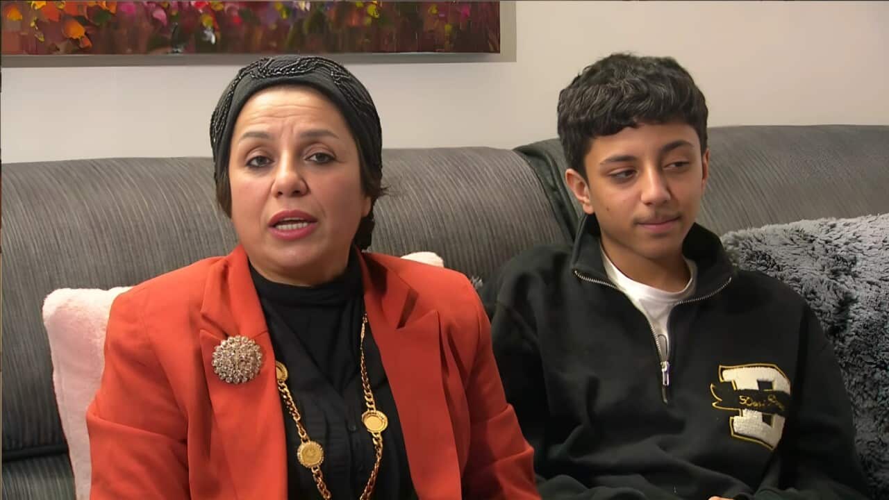 thumbnail_Ashwaq Shallal and one of her sons (SBS).jpg