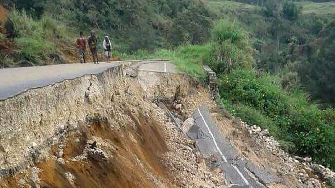 Damage to a road near Mendi in Papua New Guinea's highlands region after a 7.5-magnitude earthquake. (MELVIN LEVONGO/AFP/Getty Images)