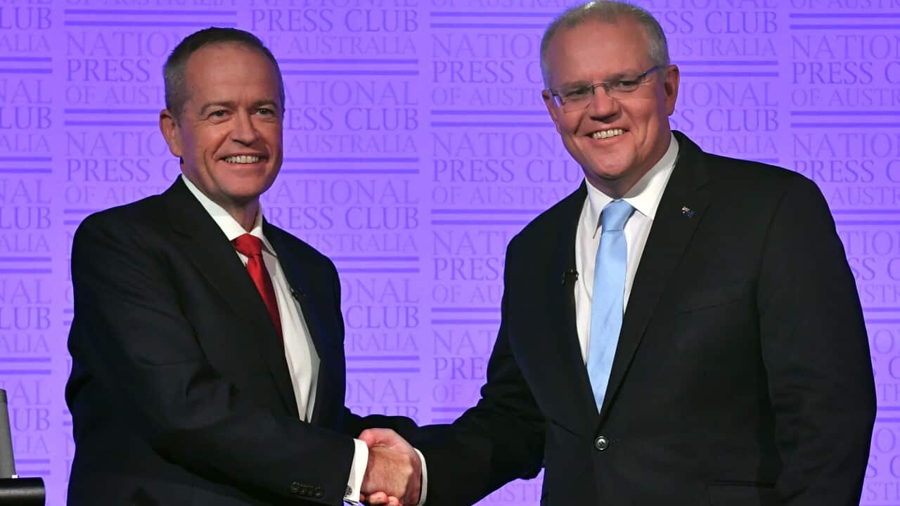 Leader of the Opposition Bill Shorten and Prime Minister Scott Morrison shake hands before the third Leaders Debate at the National Press Club in Canberra, Wednesday, May 8, 2019. (AAP Image/Mick Tsikas) NO ARCHIVING