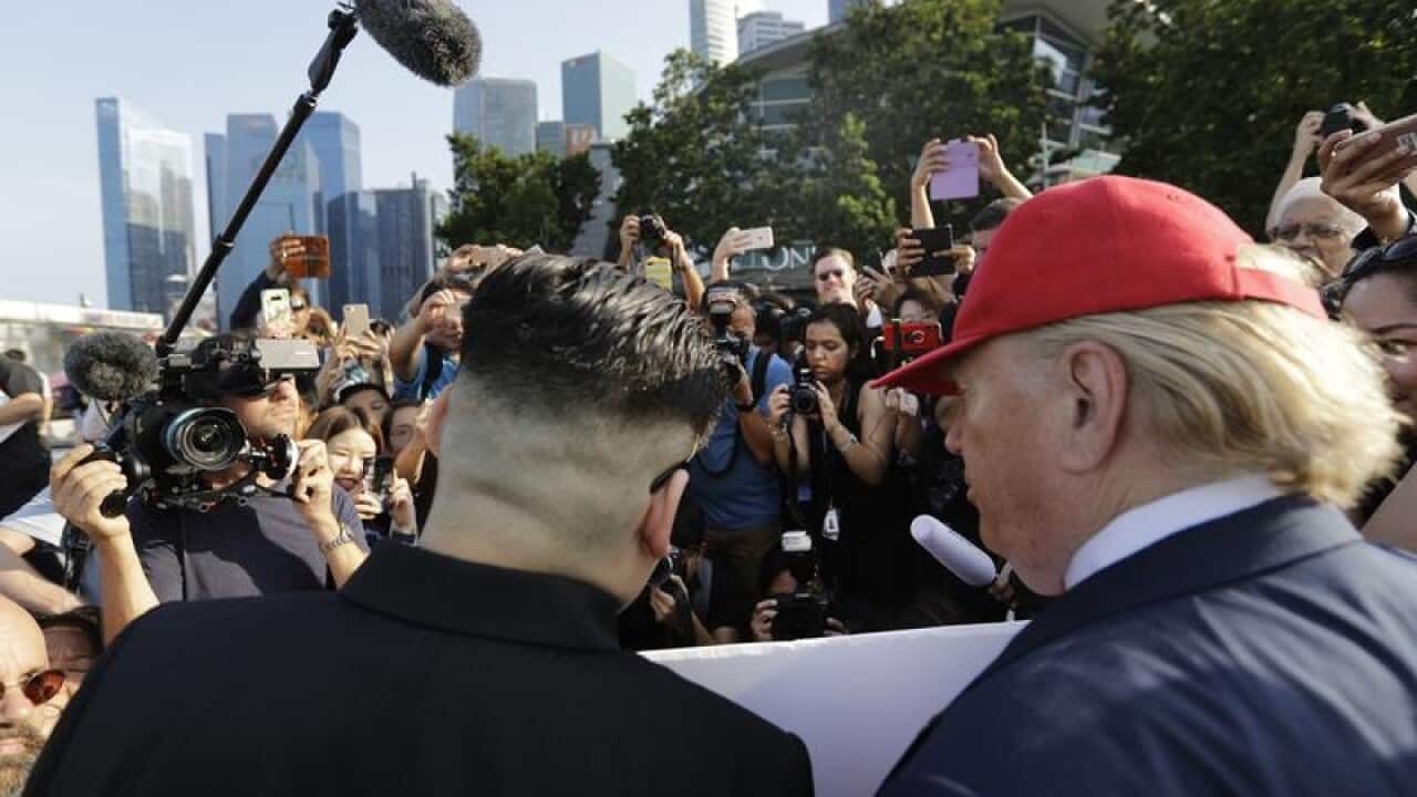Kim Jong Un and Donald Trump impersonators in Singapore