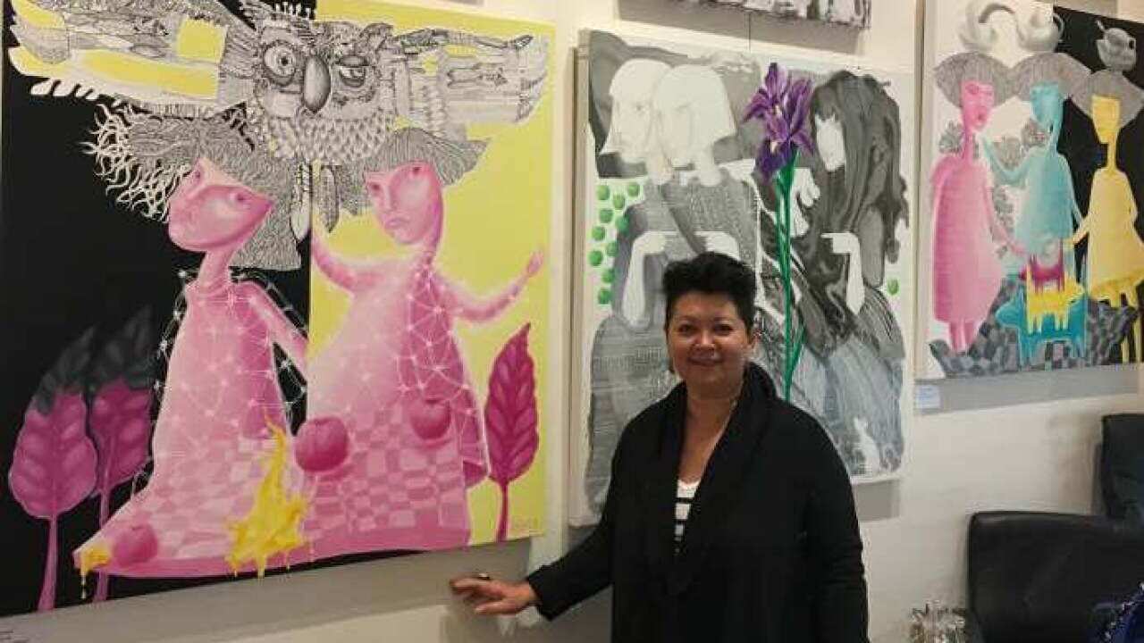 Yelena Revis preparing for opening at Ryazanoff Gallery