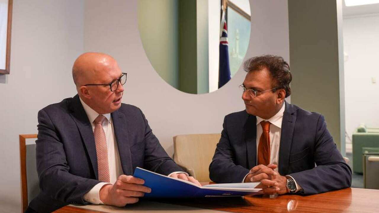 Jacob Vadakkedathu with Liberal leader Peter Dutton Credit: Facebook: Jacob Vadakkedathu