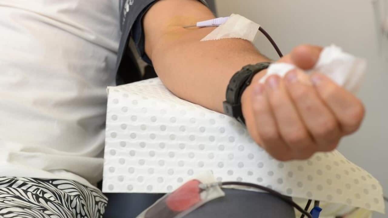 A man donates blood