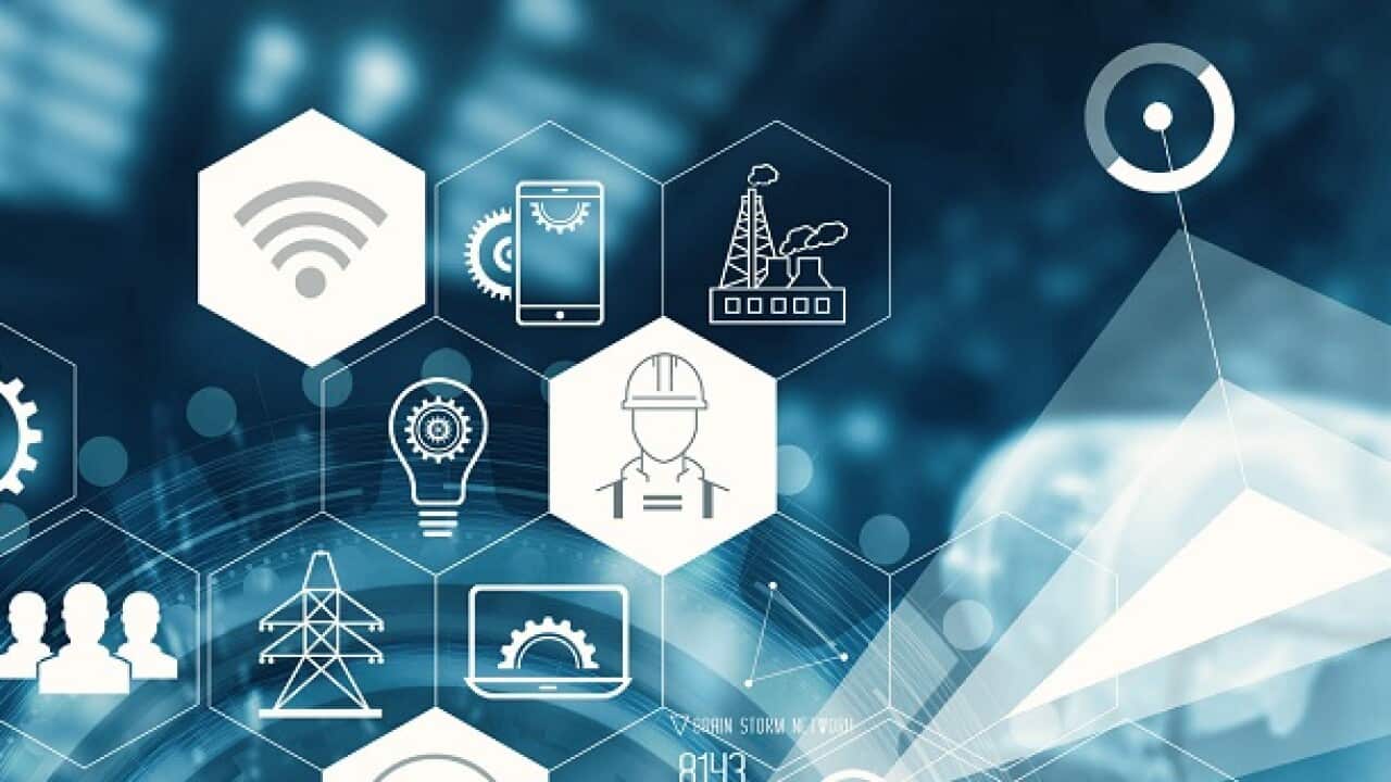 Manager Technicial Industrial Engineer working and control roboticts with monitoring system software and icon industry network connection on tablet.