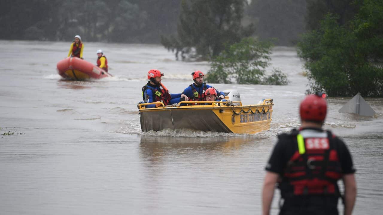 SES flood rescue and Surf Life Saving Association boats are seen on the Hawkesbury River at Sackville in north western Sydney on 23 March, 2021.