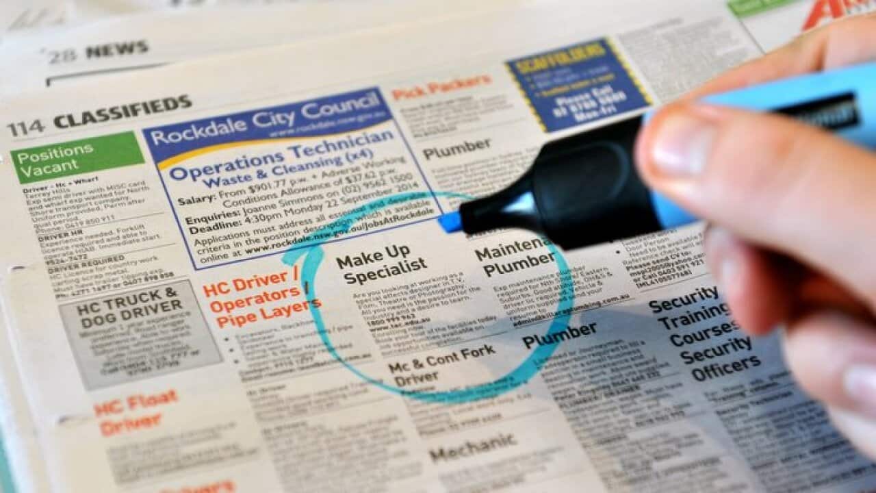 Employment advertising in a newspaper in Sydney. The number of jobs being advertised hit a 17-month high in August, suggesting the labour market is improving despite after a jump in the unemployment rate. (AAP Image/Joel Carrett) NO ARCHIVING