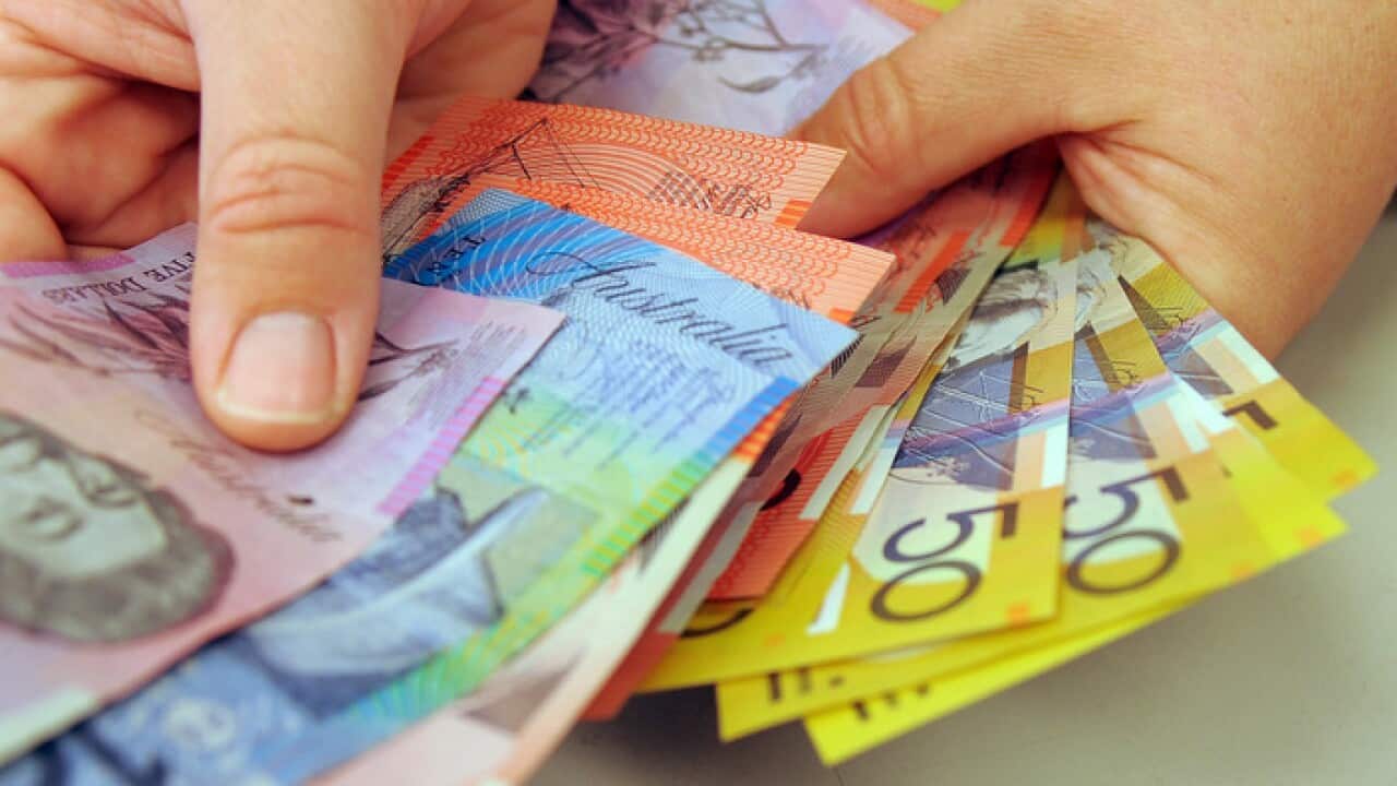 Banknotes being counted in Canberra
