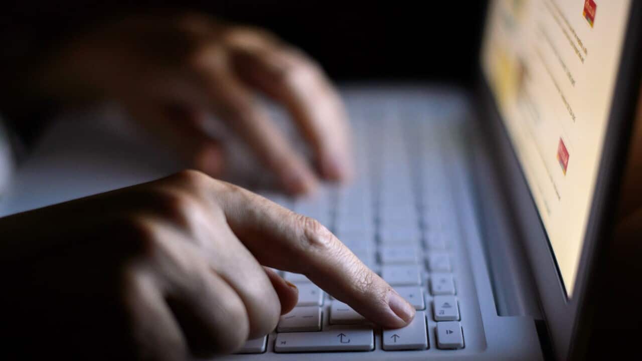 A woman using a laptop