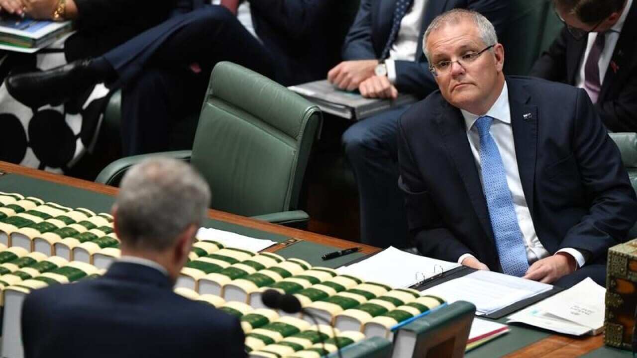 Leader of Opposition Bill Shorten and Prime Minister Scott Morrison (R
