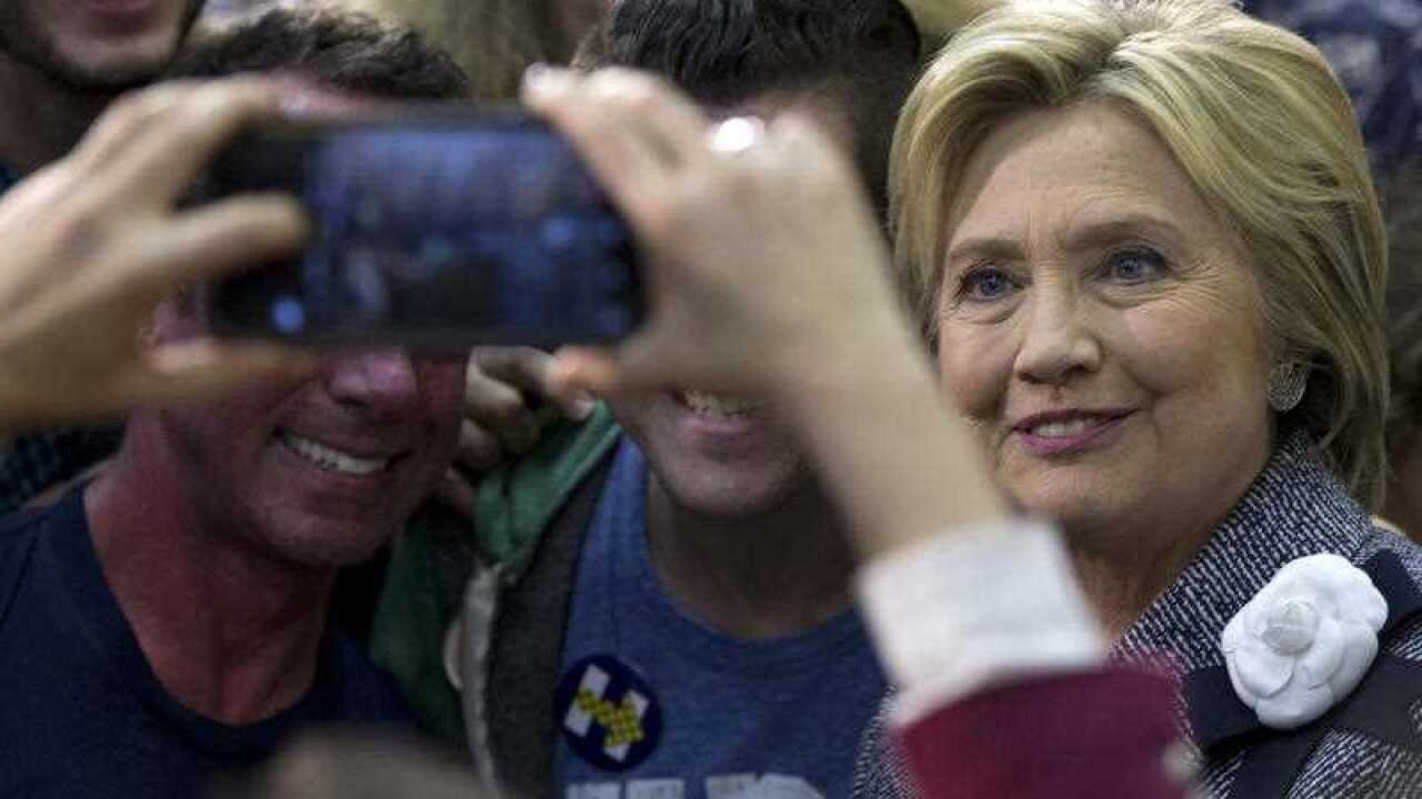 Democratic presidential candidate Hillary Clinton greets supporters and takes photos during a campaign event at the Grady Cole Center in Charlotte, N.C.