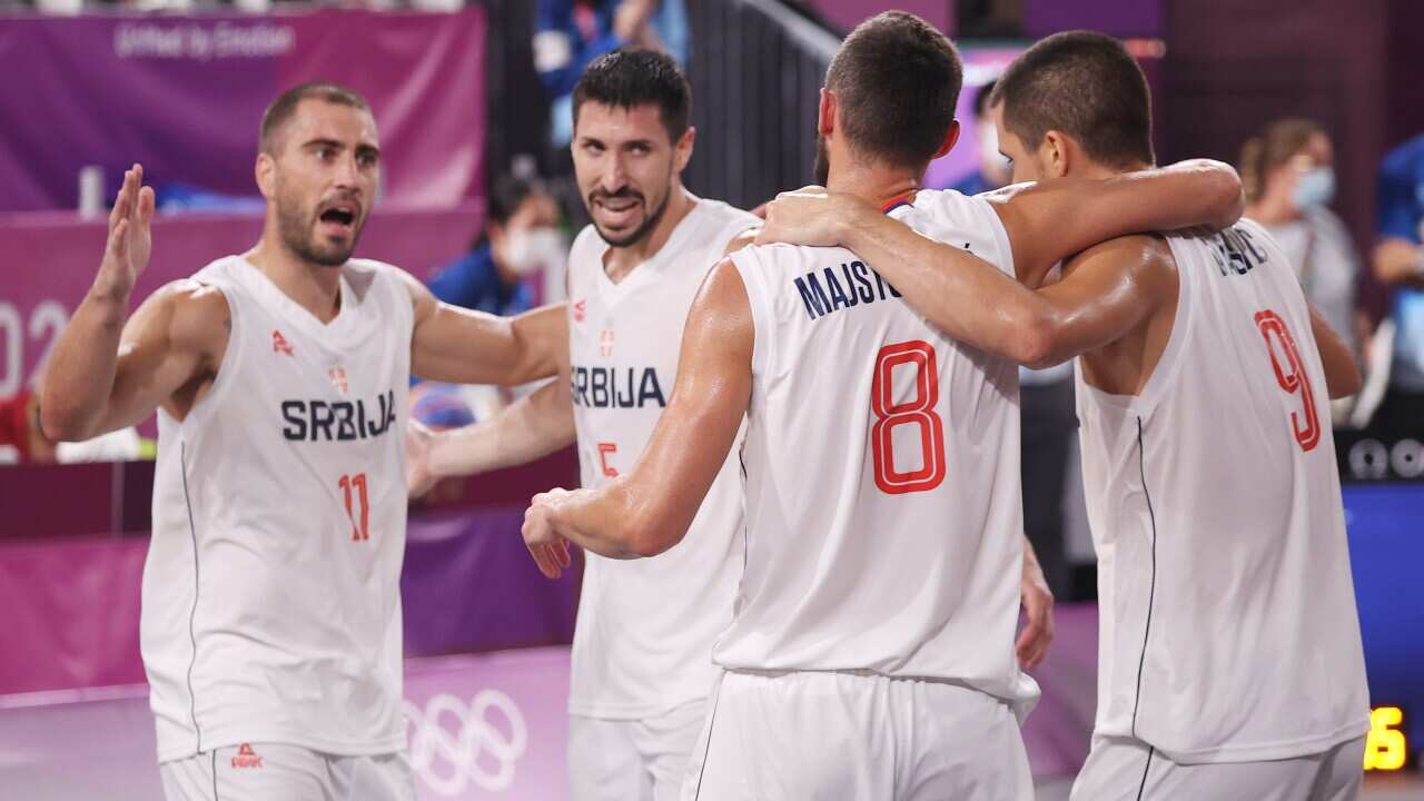 Serbian team in basketball 3x3 celebrates after winning bronze at the Tokyo 2020 Olympic Games
