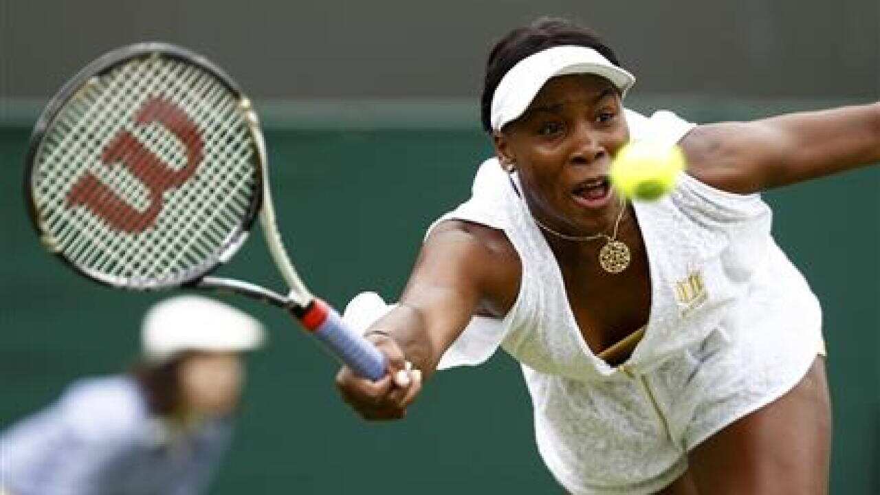 venus-williams-eases-through-at-wimbledo-555941353-large.jpg