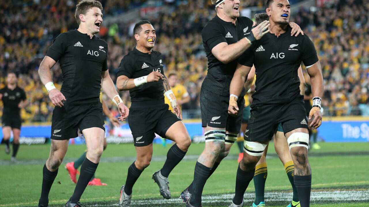 New Zealand's Jerome Kaino celebrates with his team mates