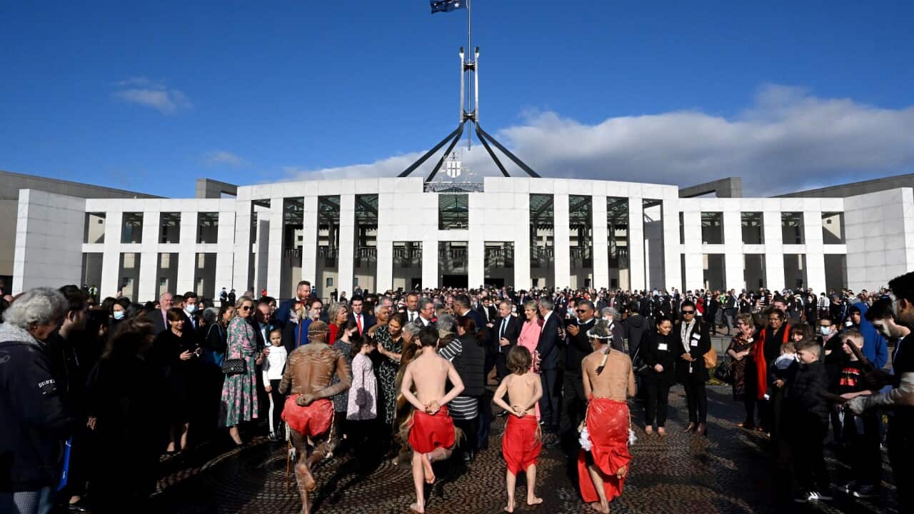A smoking ceremony is held in the forecourt during the opening of the 47th Federal Parliament at Parliament House in Canberra, Tuesday, July 26, 2022. (AAP Image/Mick Tsikas) NO ARCHIVING