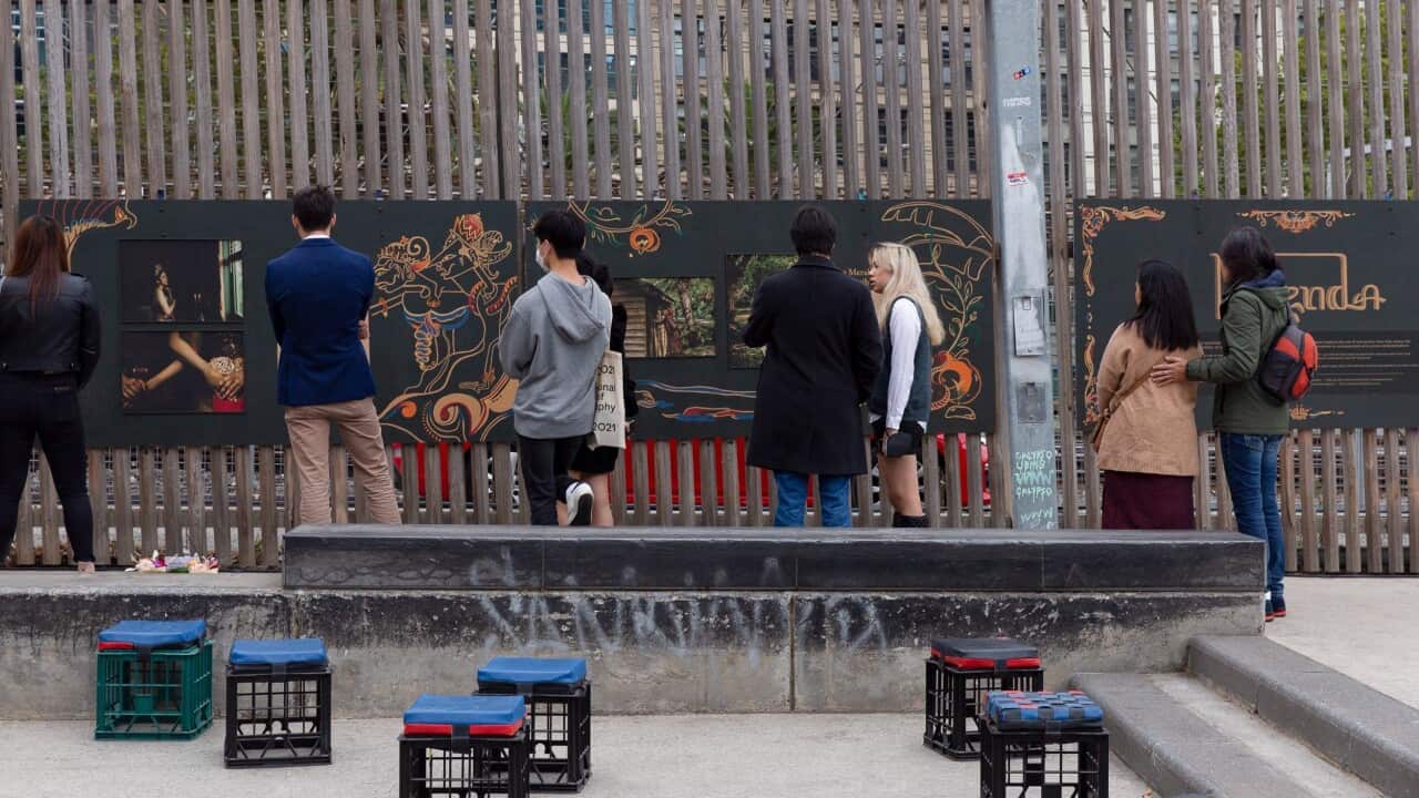Signal Gallery visitors immersing themselves and enjoying a mural of Indonesian legends as part of the LEGENDA Exhibition.