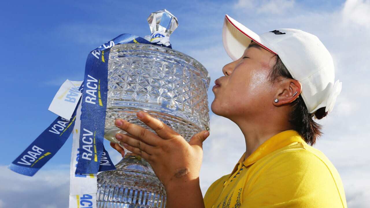 South Korea's Jiyai Shin celebrates with the Ladies Masters trophy