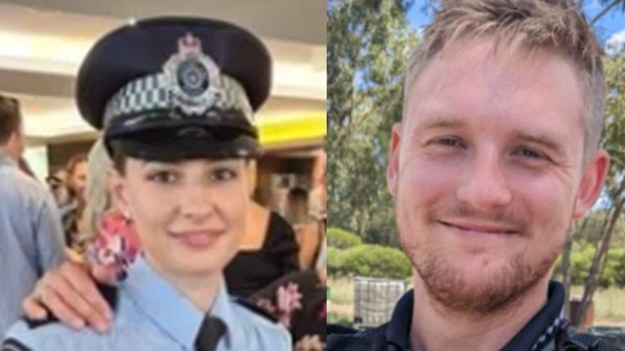 Composite image of two young police officers.